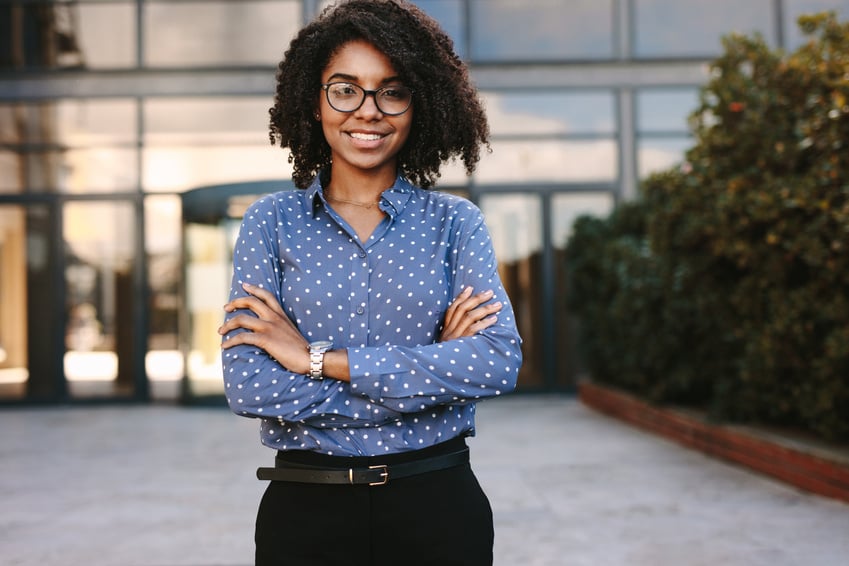 Female Business Professional Standing Confidently