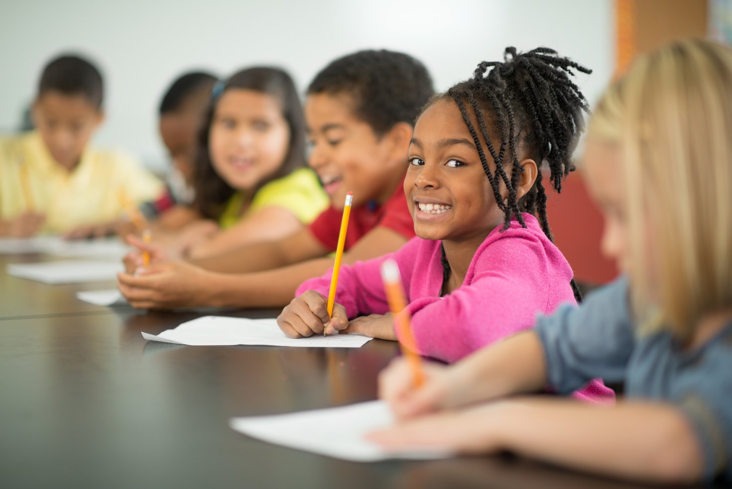 Young students writing